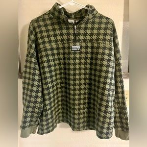 Medium Adidas 1/4 zip, olive & black pattern.